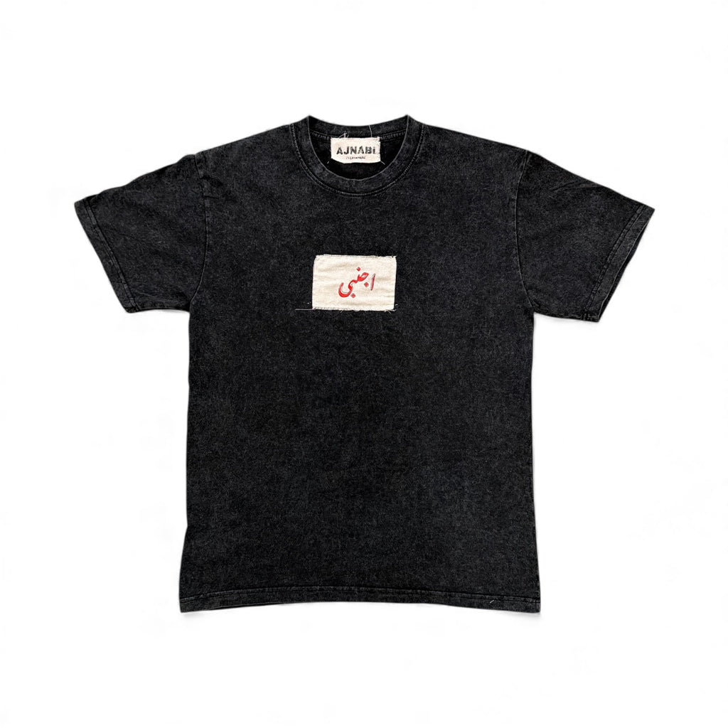 Black t-shirt hand stitched patchwork and blockprint urdu logo on 100% cotton. 