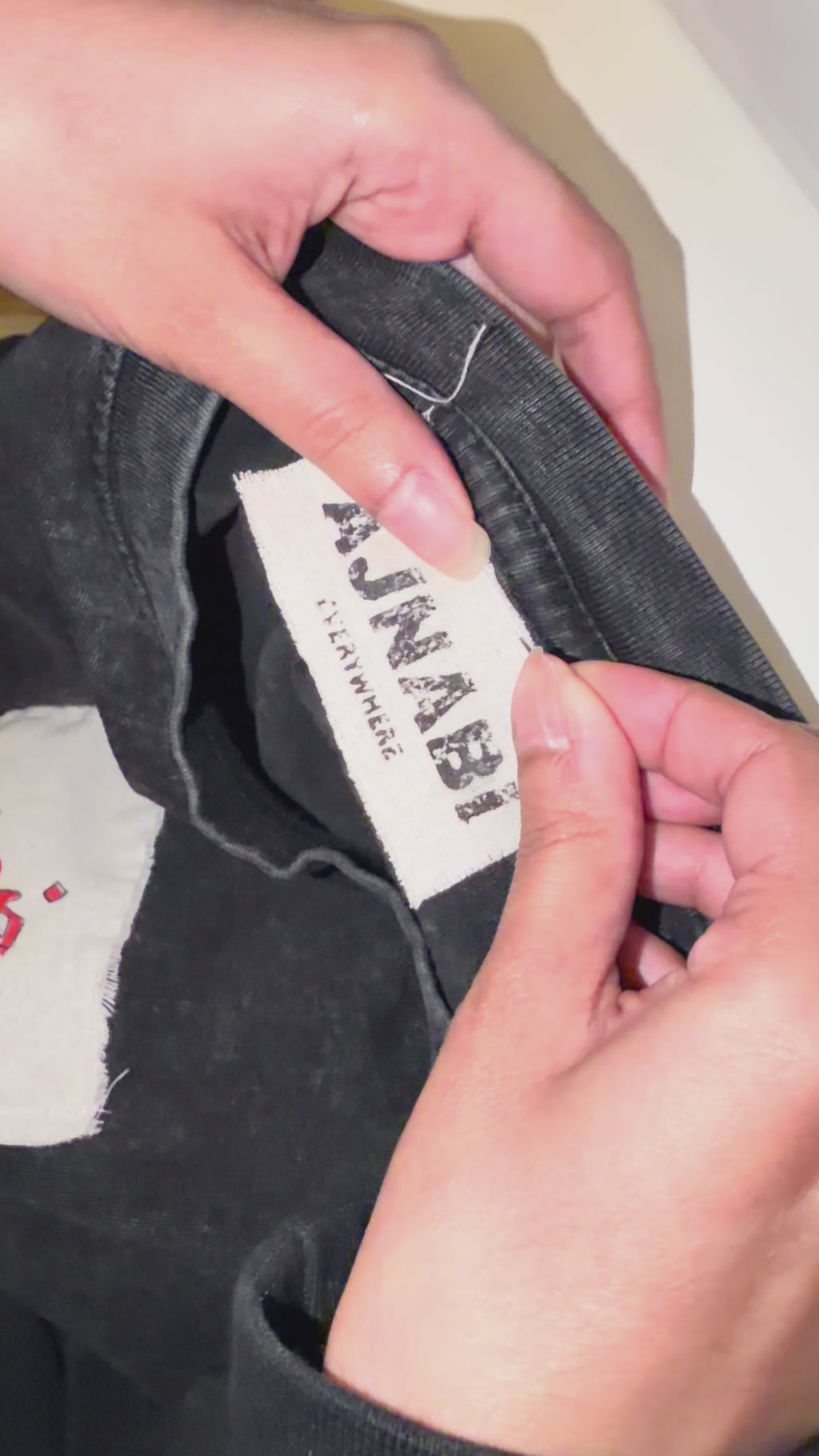 Hand stitching tags, behind the scene, raw 100% cotton patches.